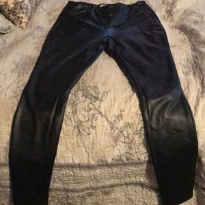 Black fitted leather pants
